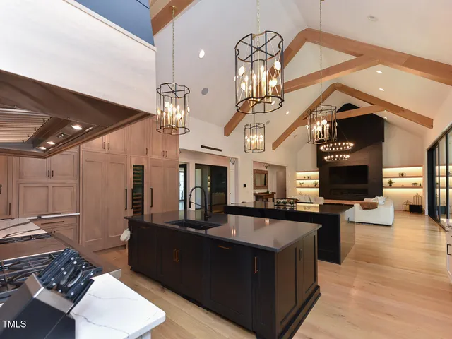 a view of a livingroom with furniture window and wooden floor