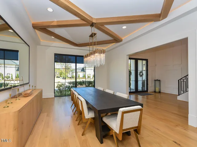a view of kitchen island with furniture and wooden floor