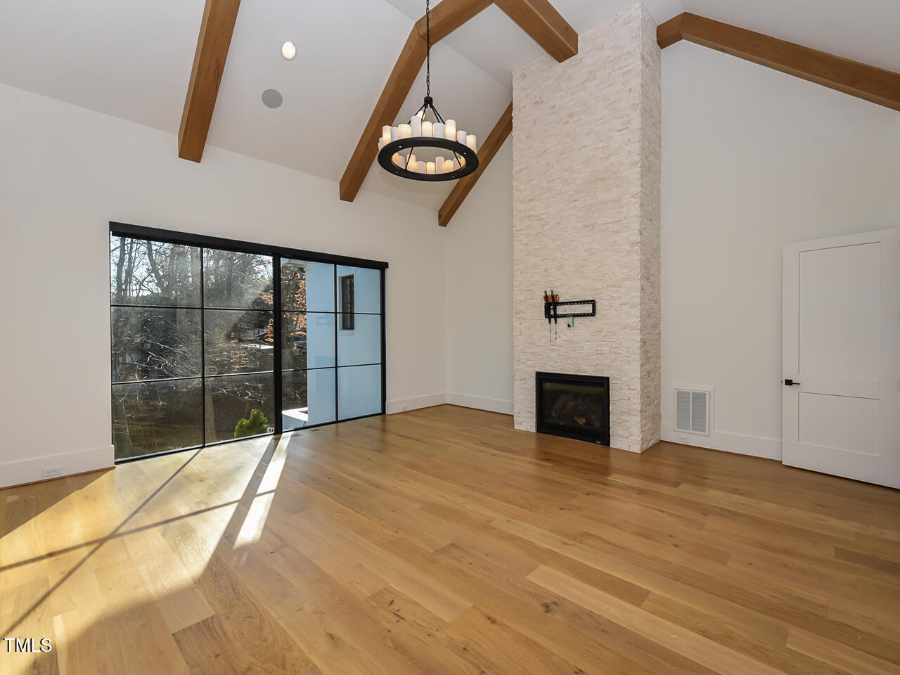 1425 Sky Vista Way Raleigh, NC 27613 - Photo 24 of 67 a view of an empty room with glass door