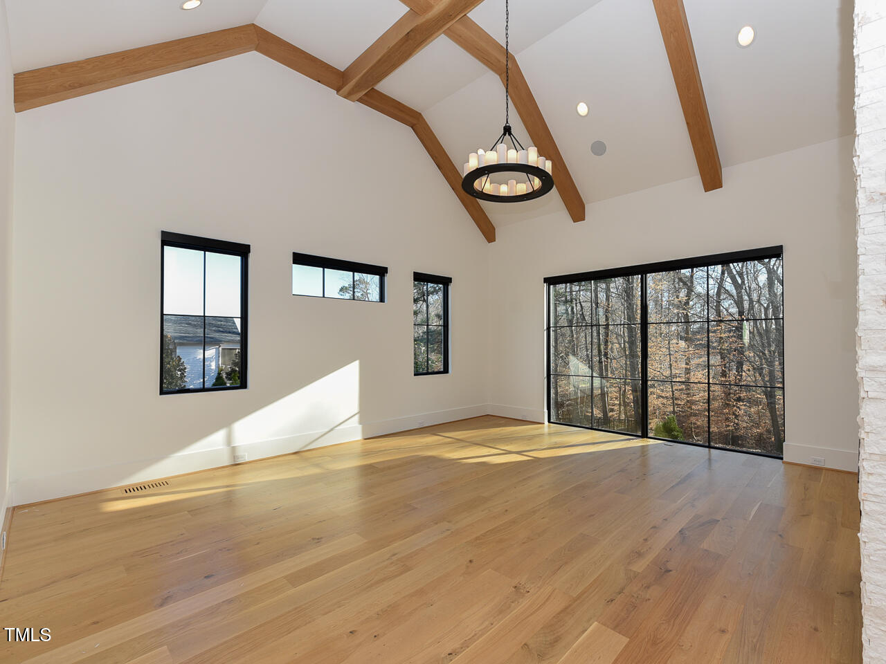 1425 Sky Vista Way Raleigh, NC 27613 - Photo 26 of 67 a view of an empty room with wooden floor