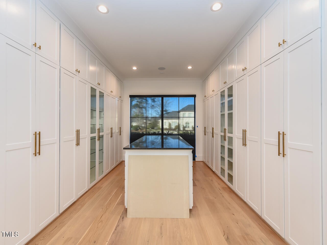 1425 Sky Vista Way Raleigh, NC 27613 - Photo 35 of 67 a view of a hallway with wooden floor and staircase