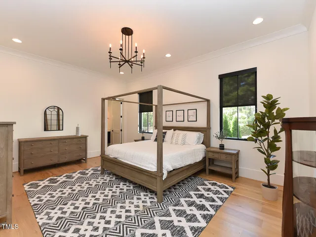 a living room with furniture rug and window