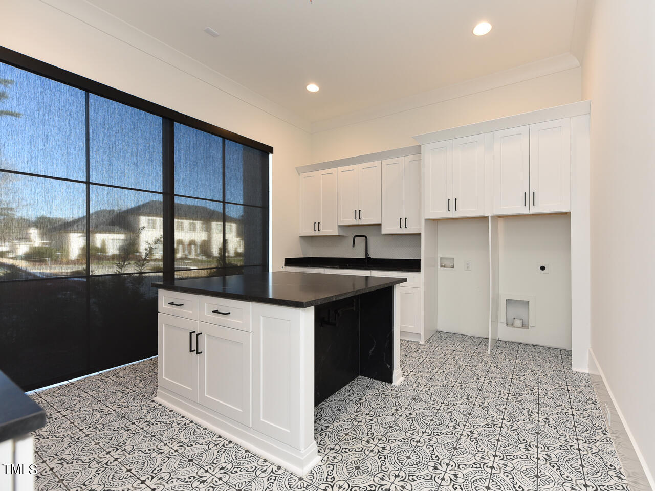 1425 Sky Vista Way Raleigh, NC 27613 - Photo 40 of 67 a kitchen with granite countertop a sink and cabinets