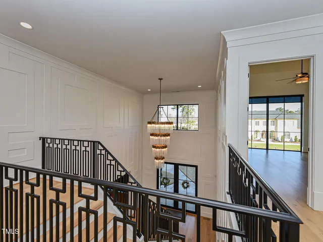 a swimming pool with outdoor seating and yard