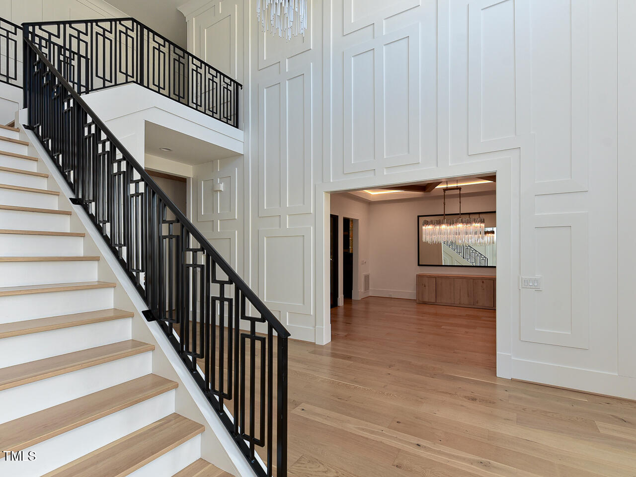 1425 Sky Vista Way Raleigh, NC 27613 - Photo 44 of 67 a view of staircase with white walls and railing