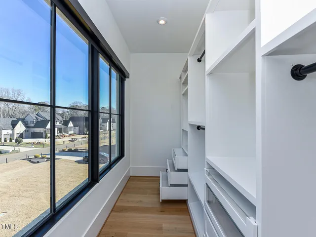 a view of a back yard from a balcony