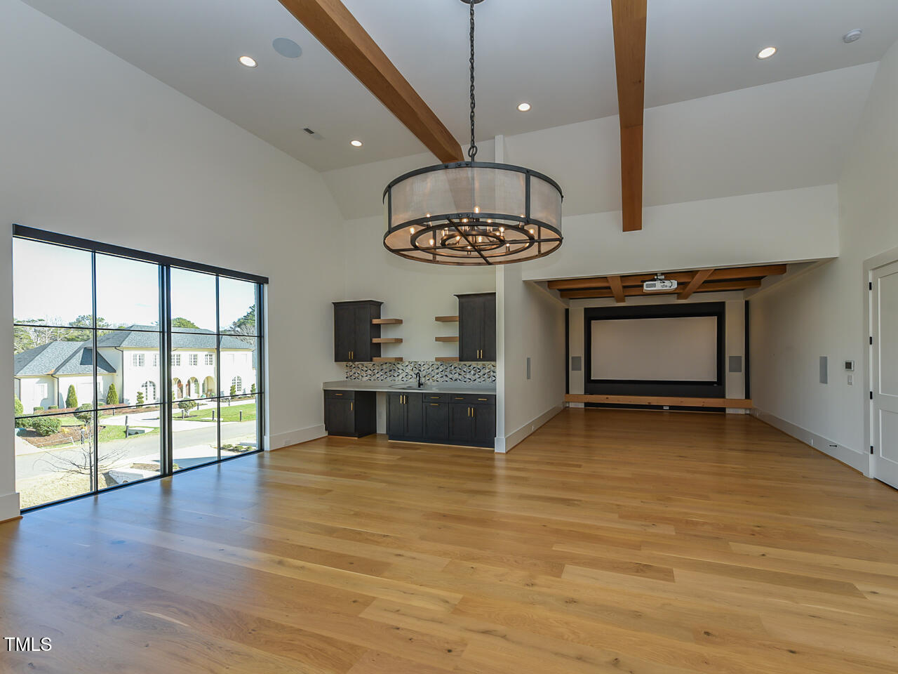 1425 Sky Vista Way Raleigh, NC 27613 - Photo 49 of 67 a view of an empty room with a window and kitchen view