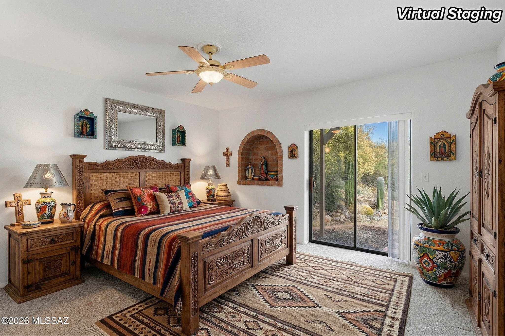 3940 West Alvaro Road Tucson, AZ 85746 - Photo 9 of 44 Primary Bedroom space with what out patio and views