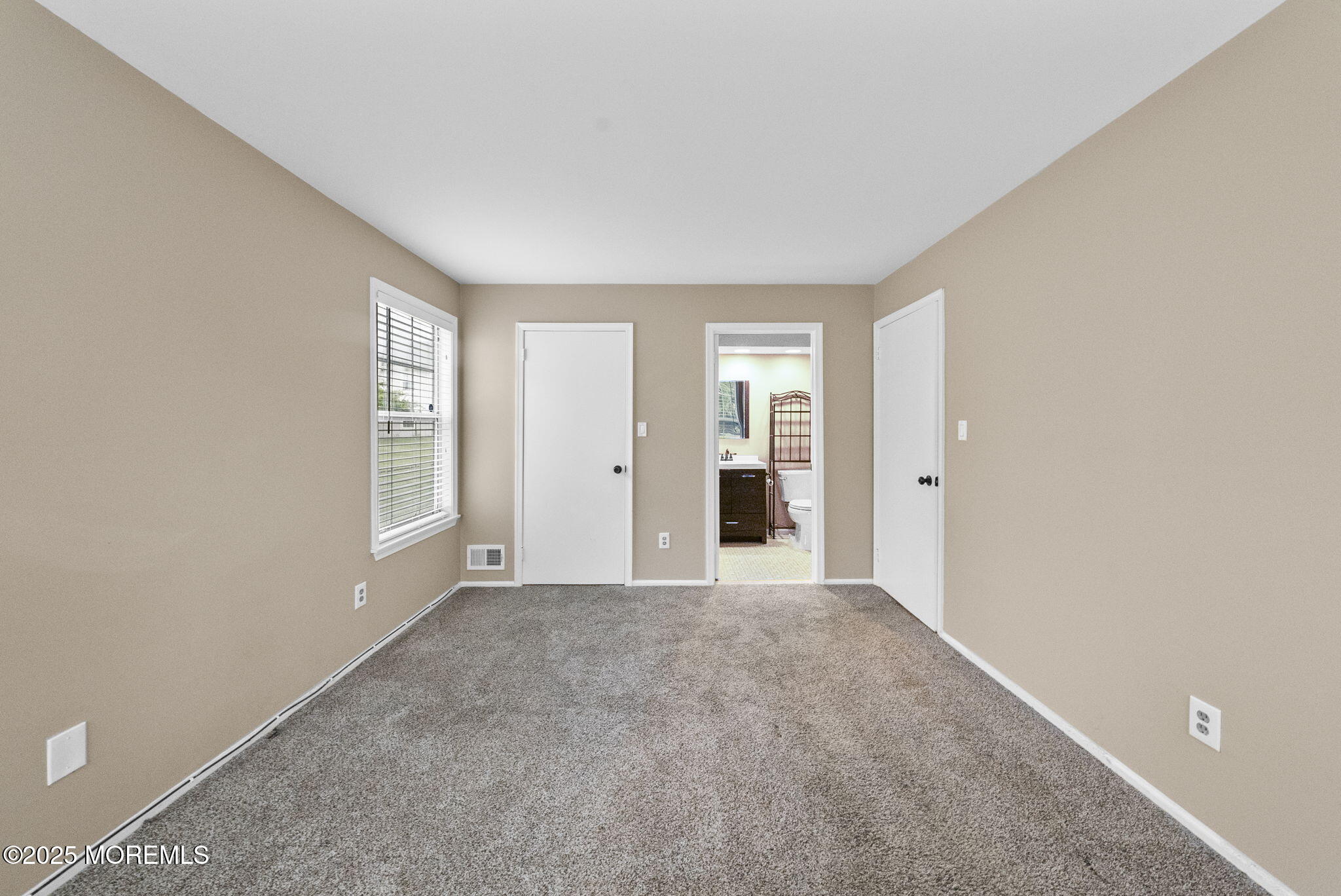 353 Sequoia Court Howell, NJ 07731 - Photo 15 of 27 an empty room with windows and closet