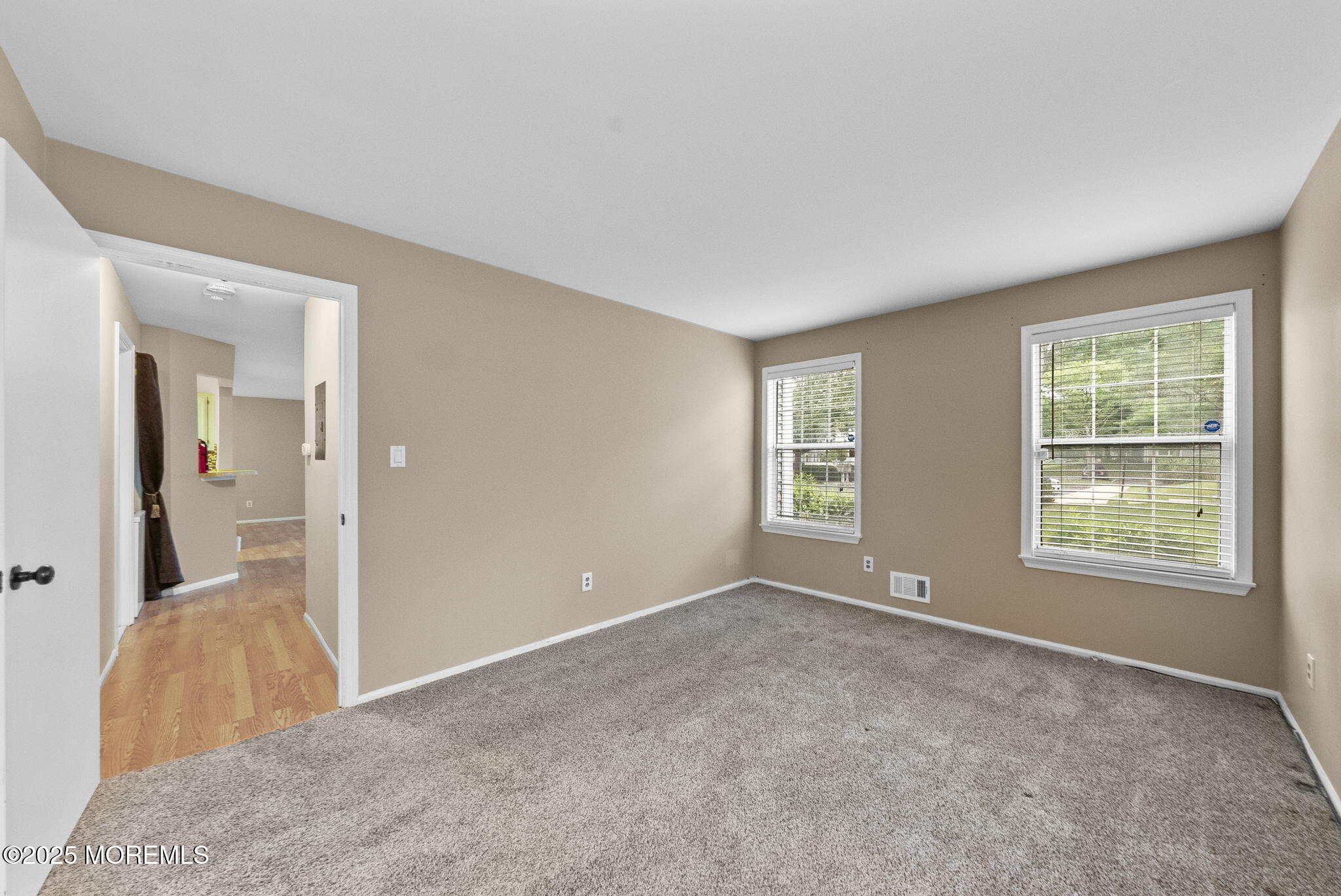 353 Sequoia Court Howell, NJ 07731 - Photo 16 of 27 an empty room with windows and closet