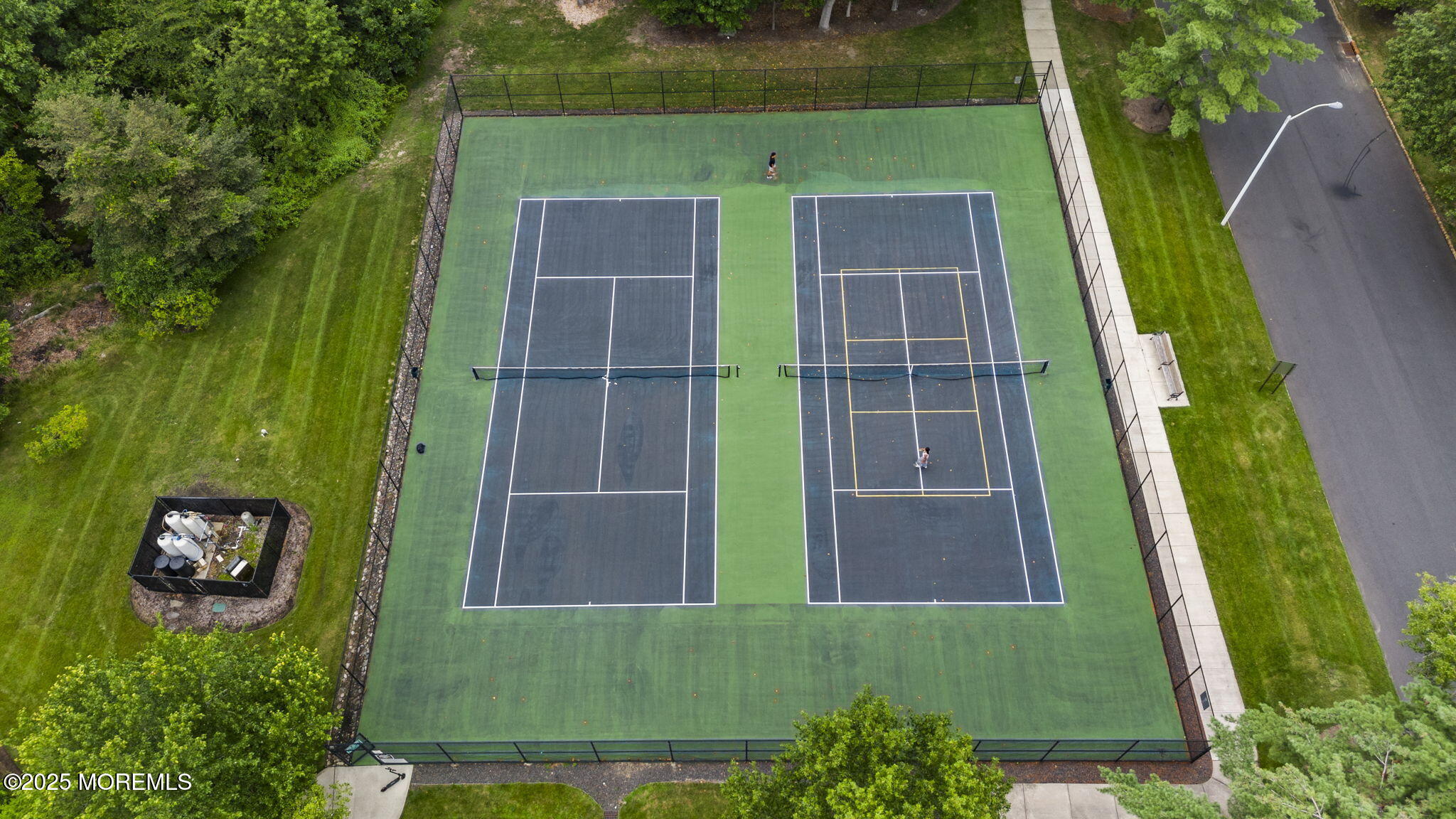 353 Sequoia Court Howell, NJ 07731 - Photo 25 of 27 an aerial view of a residential houses with outdoor space and trees