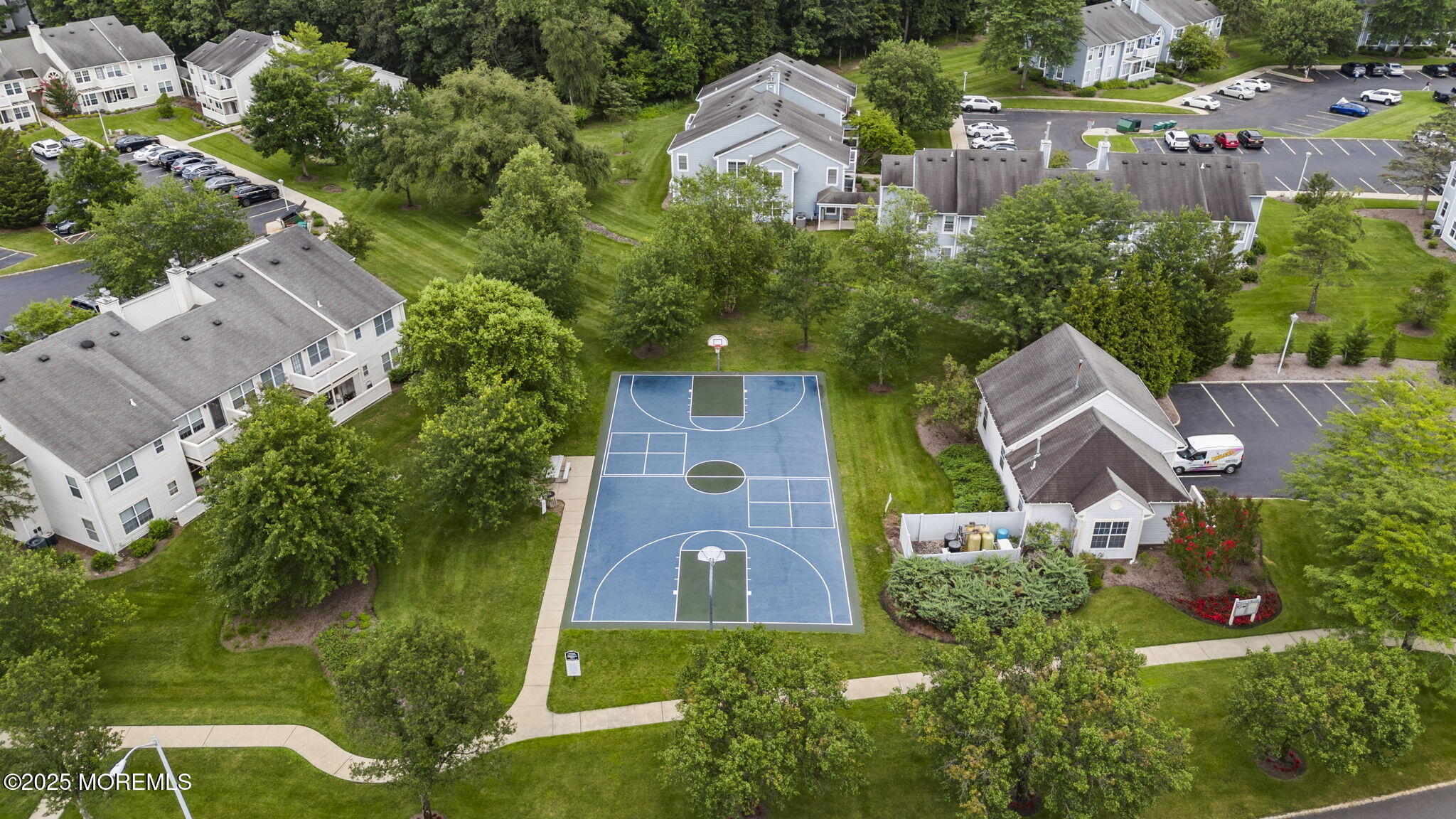 353 Sequoia Court Howell, NJ 07731 - Photo 27 of 27 an aerial view of multiple houses with yard