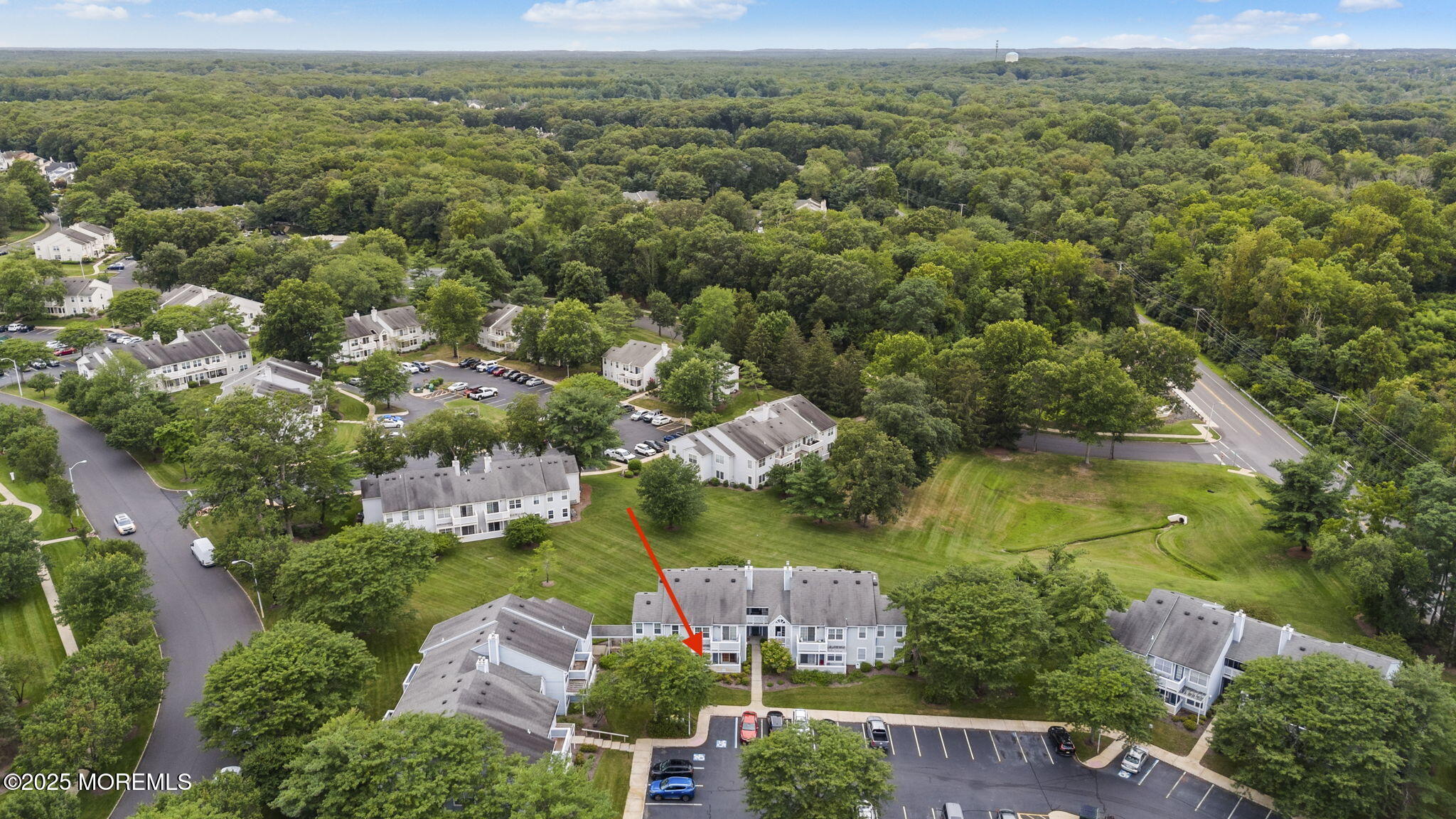 353 Sequoia Court Howell, NJ 07731 - Photo 4 of 27 an aerial view of residential houses with outdoor space and lake view