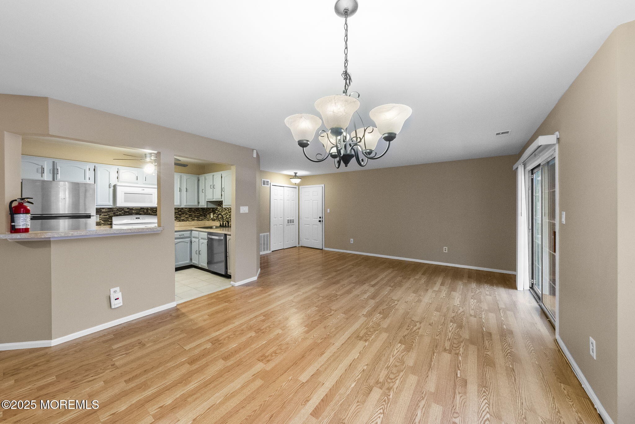 353 Sequoia Court Howell, NJ 07731 - Photo 8 of 27 a view of a kitchen with microwave and cabinets