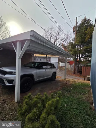 a car park in front of house