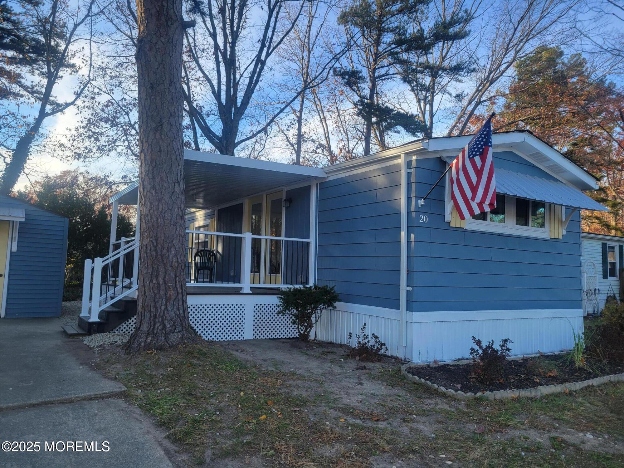 20 Judith Way Jackson, NJ 08527 - Photo 1 of 22 a front view of a house with garden