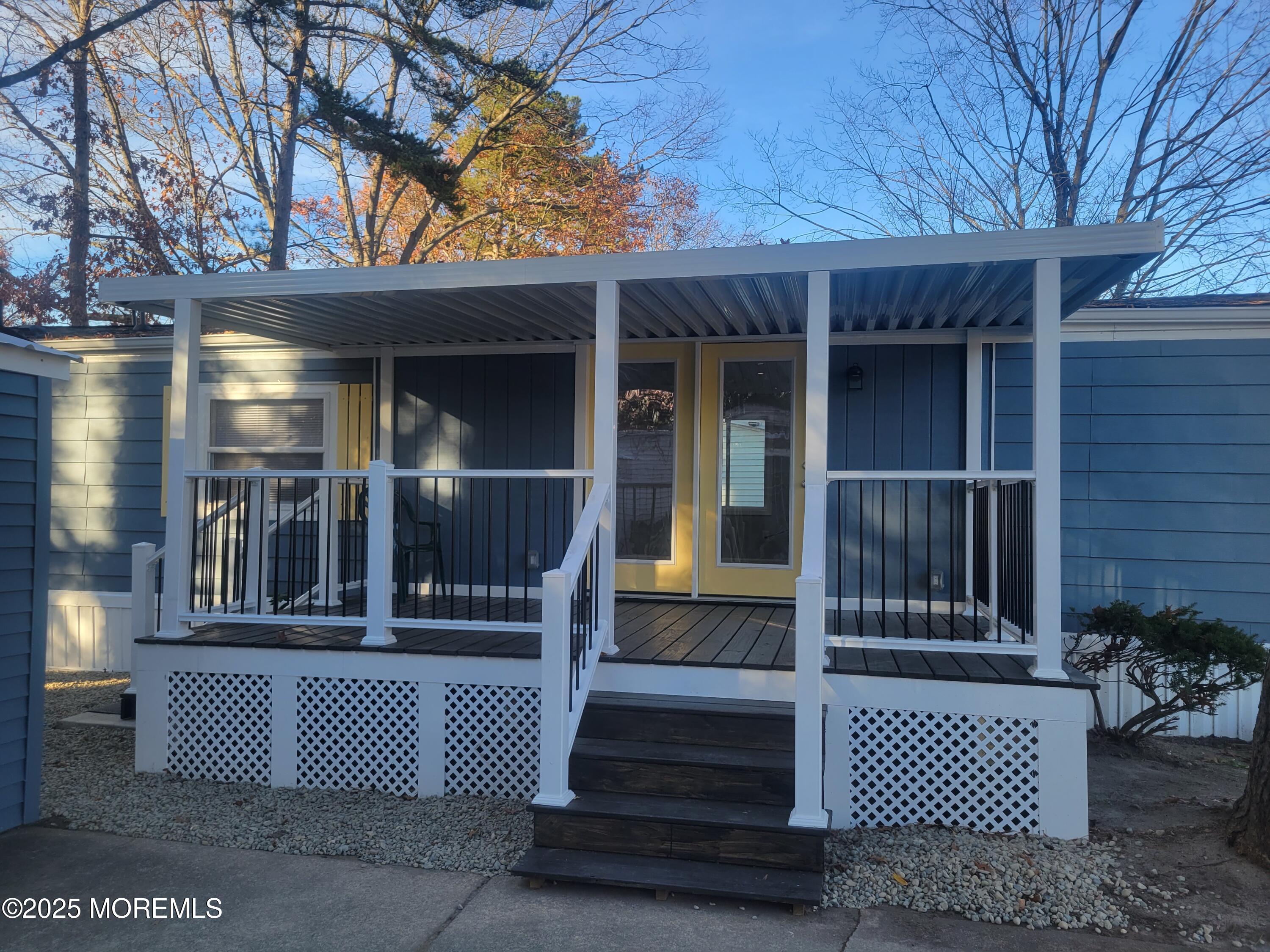 20 Judith Way Jackson, NJ 08527 - Photo 19 of 22 a view of a house with a bench