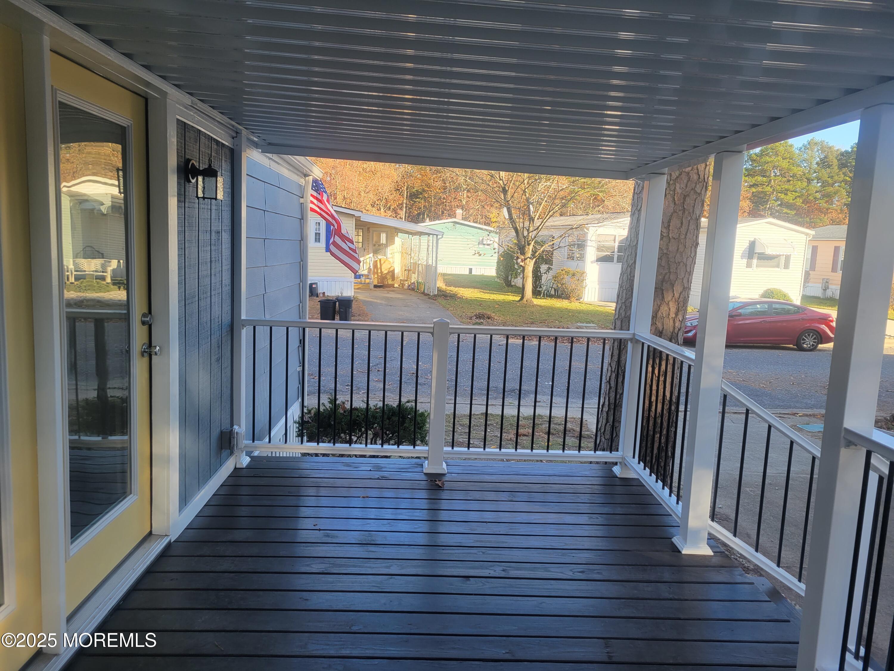 20 Judith Way Jackson, NJ 08527 - Photo 21 of 22 a view of a balcony with wooden floor
