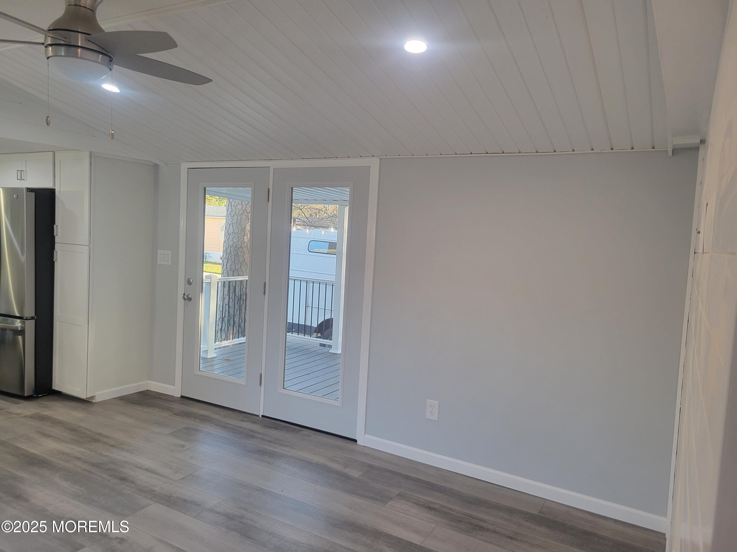 20 Judith Way Jackson, NJ 08527 - Photo 3 of 22 an empty room with wooden floor closet and windows