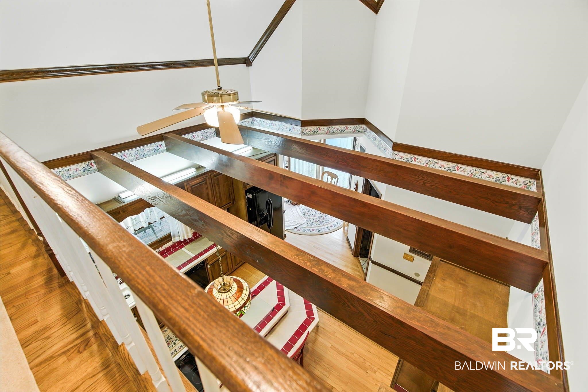 17270 Davis Road Summerdale, AL 36580 - Photo 28 of 97 Staircase with wood finished floors and a ceiling fan