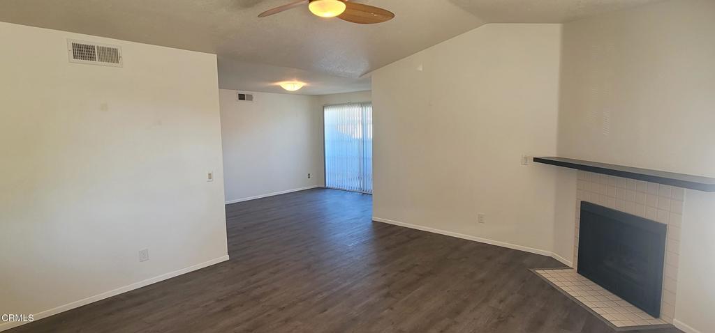 2077 Blackberry Circle Oxnard, CA 93036 - Photo 9 of 20 a view of a hallway with wooden floor