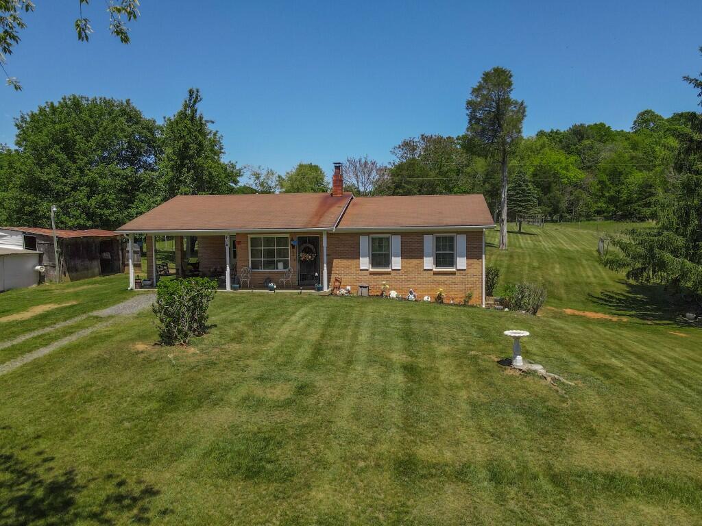 404 Baker Island Road Max Meadows, VA 24360 - Photo 1 of 66 a view of a house with a yard