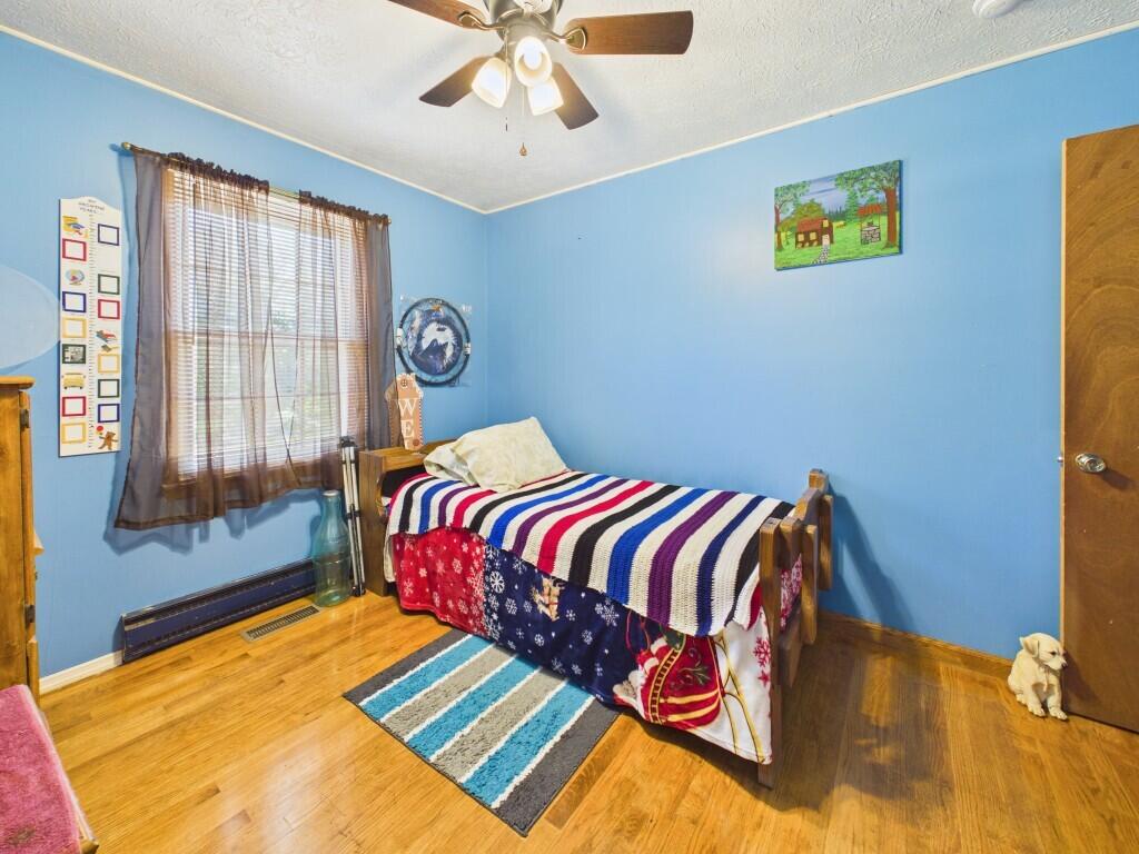 404 Baker Island Road Max Meadows, VA 24360 - Photo 45 of 66 a bedroom with a bed and a window