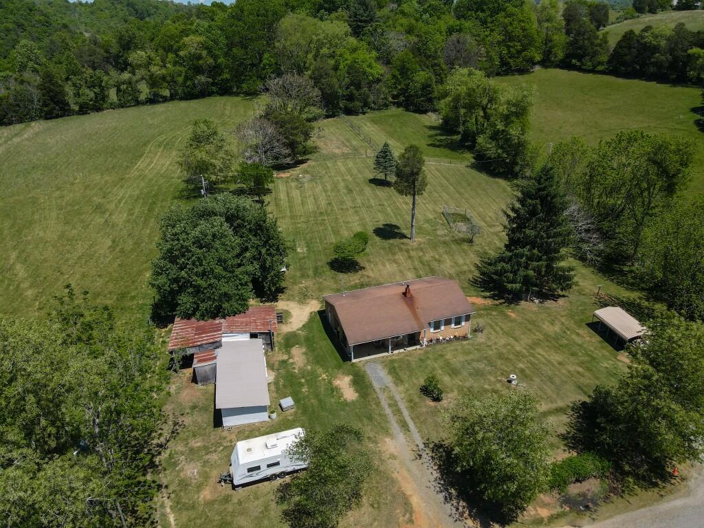 404 Baker Island Road Max Meadows, VA 24360 - Photo 65 of 66 an aerial view of residential house with outdoor space and trees all around
