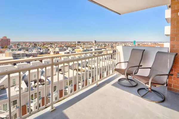 a view of a terrace with chairs
