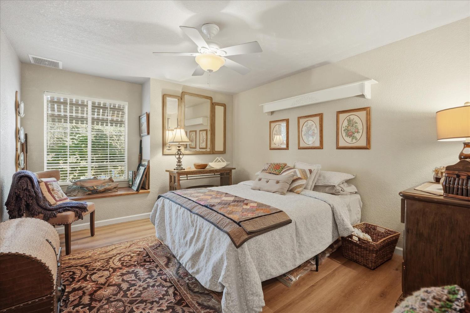 32583 River Knolls Road Coarsegold, CA 93614 - Photo 34 of 63 a bedroom with a bed and a couch