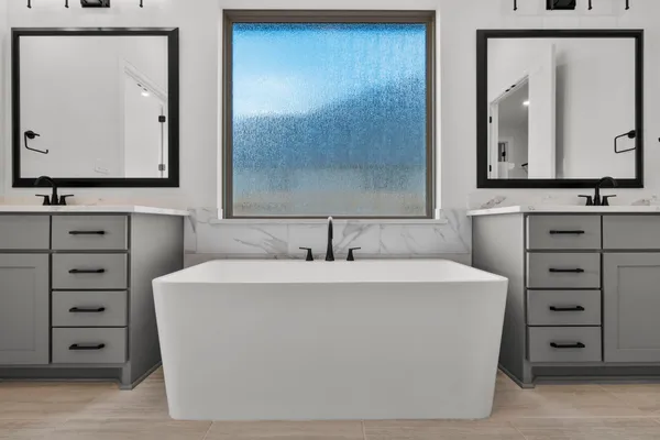 a view of a bathroom sink mirror and