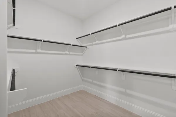 a view of a room with racks on the wall