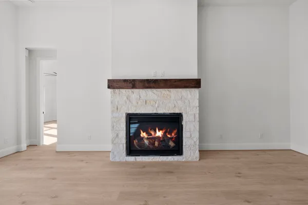 a living room with a fireplace