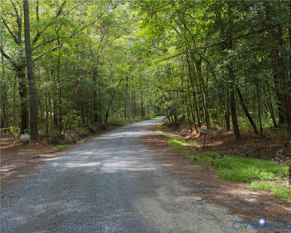 Lot 4 Kayak Trail Mathews, VA 23109 - Photo 11 of 11 a view of a field with trees in the background