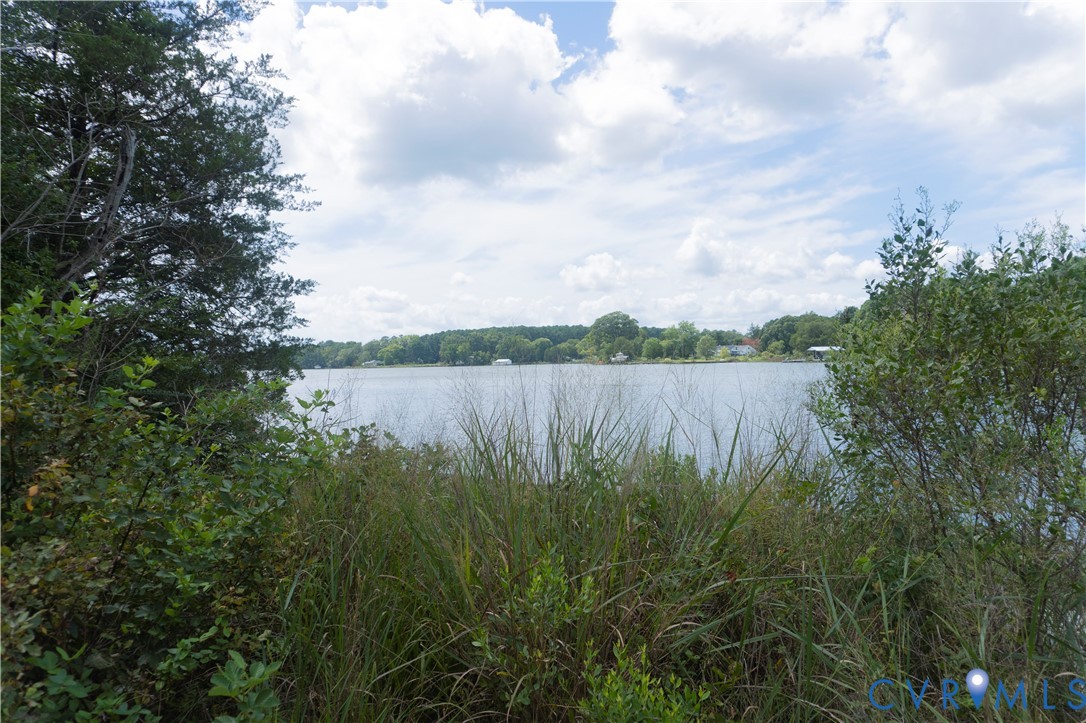 Lot 4 Kayak Trail Mathews, VA 23109 - Photo 9 of 11 a view of a lake with houses in back