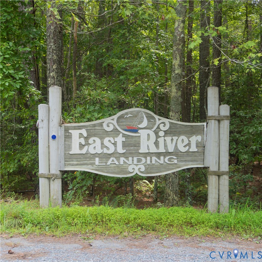Lot 4 Kayak Trail Mathews, VA 23109 - Photo 10 of 11 a view of a street sign under a large tree