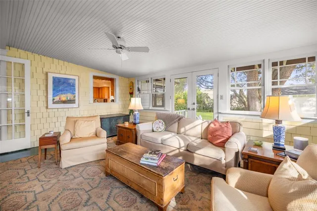 a kitchen with stainless steel appliances granite countertop a sink dishwasher stove refrigerator and cabinets