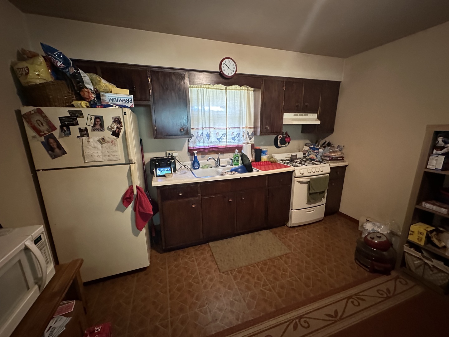1585 West Station Street Kankakee, IL 60901 - Photo 9 of 12 a room with storage and utility