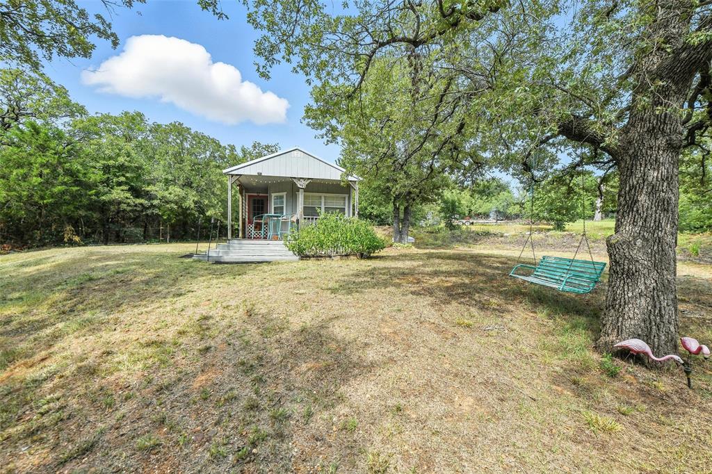 454 Bear Ridge Road Bowie, TX 76230 - Photo 16 of 36 View of grassy yard