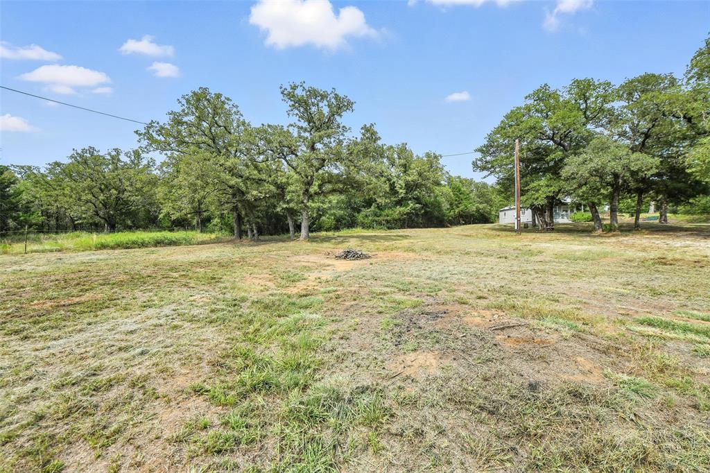 454 Bear Ridge Road Bowie, TX 76230 - Photo 22 of 36 View of yard