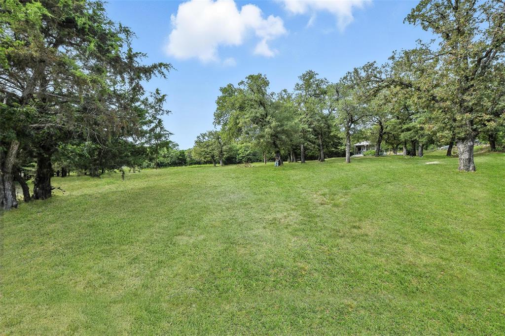 454 Bear Ridge Road Bowie, TX 76230 - Photo 34 of 36 View of grassy yard