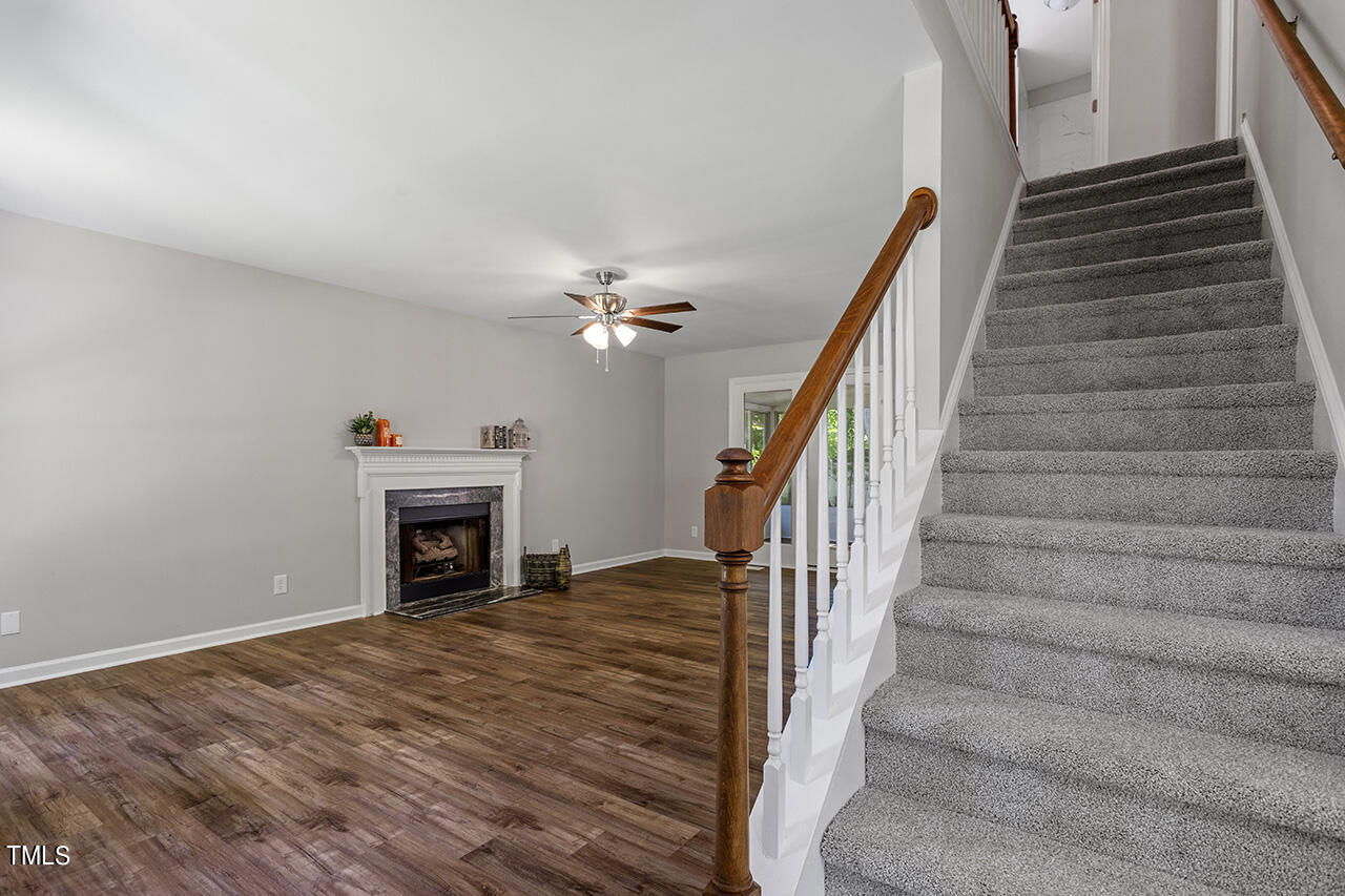 8 Warbler Lane Durham, NC 27712 - Photo 11 of 36 a view of entryway and hall with wooden floor