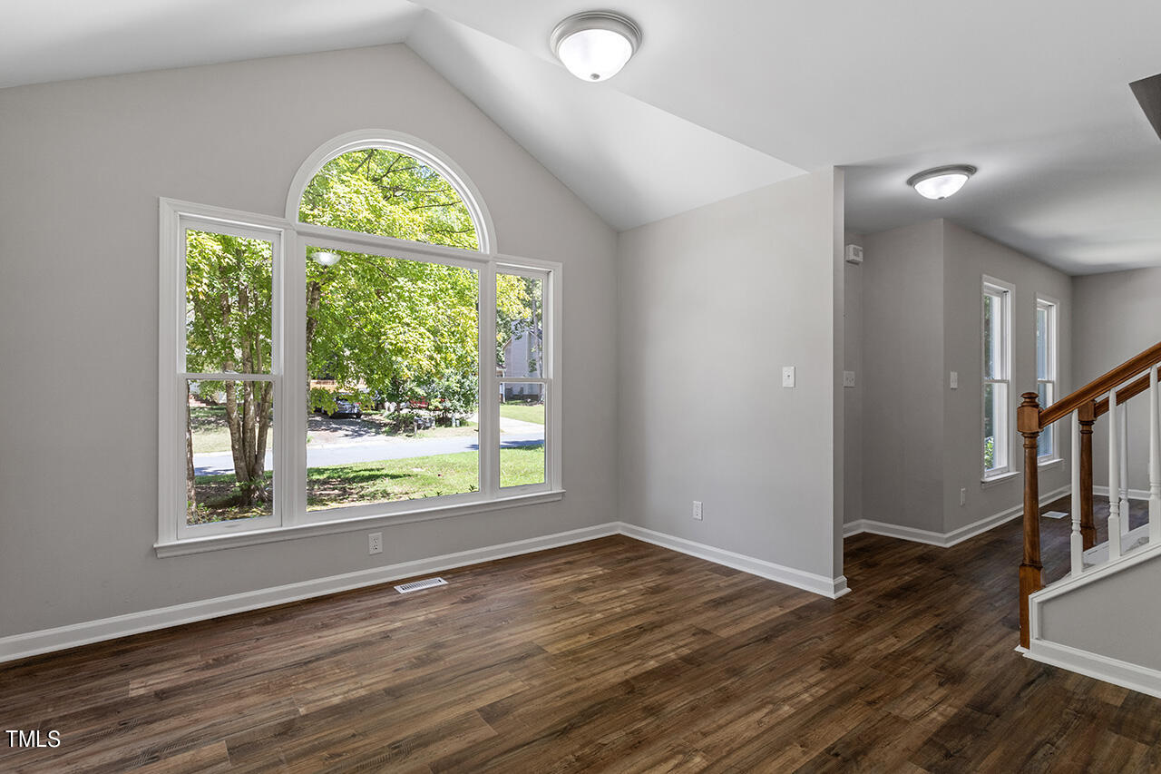 8 Warbler Lane Durham, NC 27712 - Photo 17 of 36 wooden floor in an empty room with a window