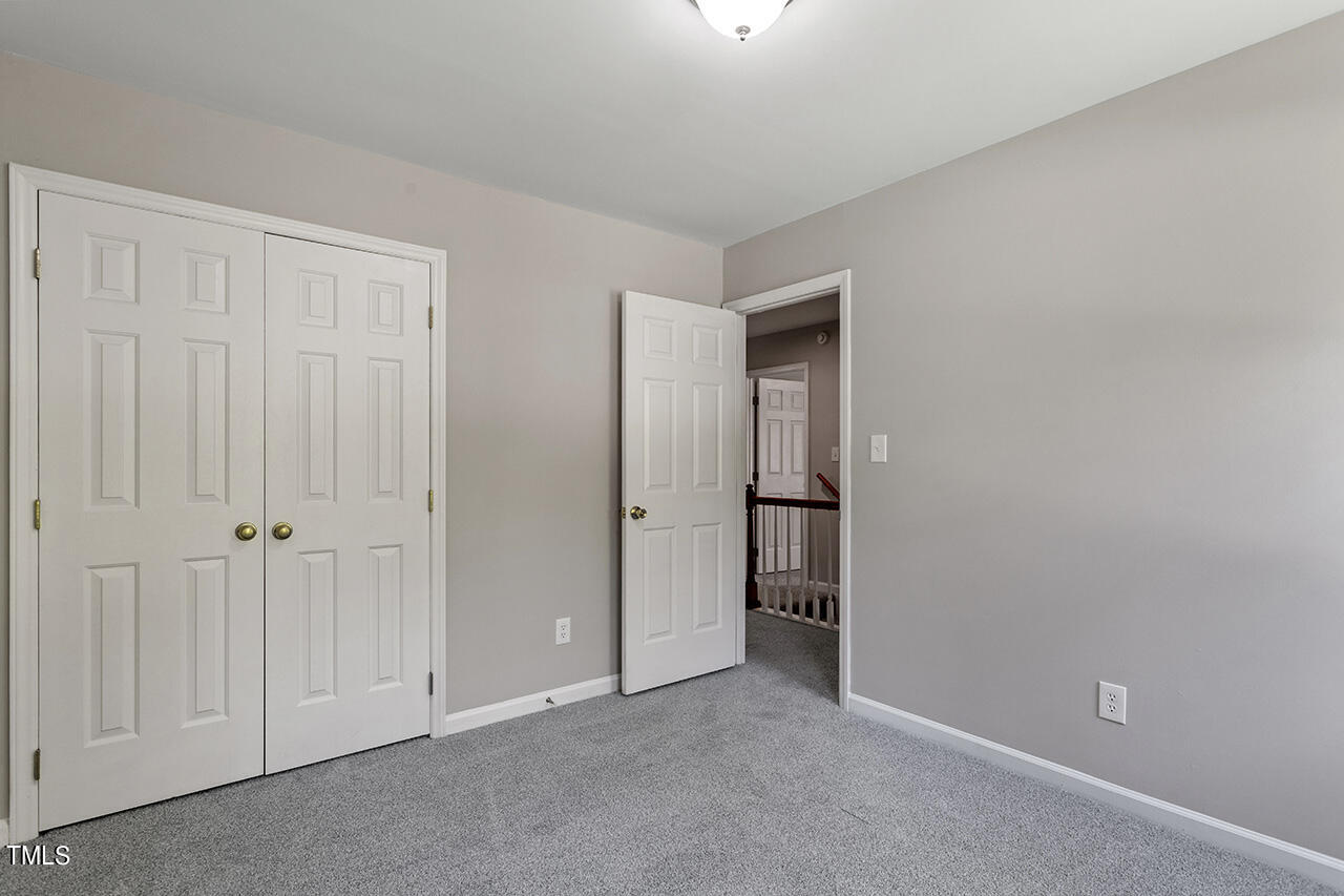 8 Warbler Lane Durham, NC 27712 - Photo 33 of 36 a view of an empty room and closet area