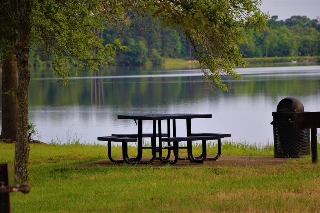 Lot 377 Timber Ridge Larue, TX 75770 - Photo 26 of 39 a view of a lake with a yard and large trees