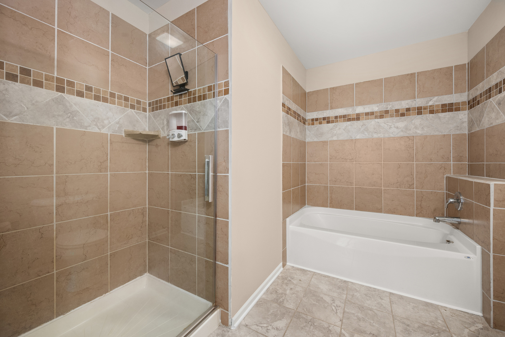 3705 Green Tree Lane DeKalb, IL 60115 - Photo 20 of 31 a bathroom with a shower and a bathtub