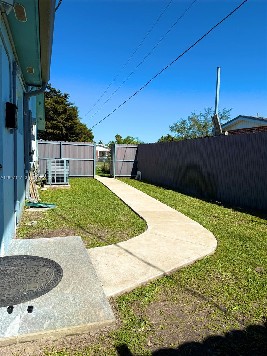 10040 Southwest 198th Street Cutler Bay, FL 33157 - Photo 13 of 13 a view of a backyard