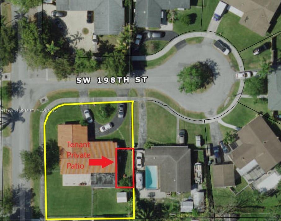 10040 Southwest 198th Street Cutler Bay, FL 33157 - Photo 16 of 17 an aerial view of a house