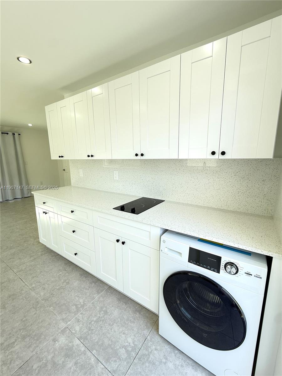 10040 Southwest 198th Street Cutler Bay, FL 33157 - Photo 5 of 13 a view of a washer and dryer