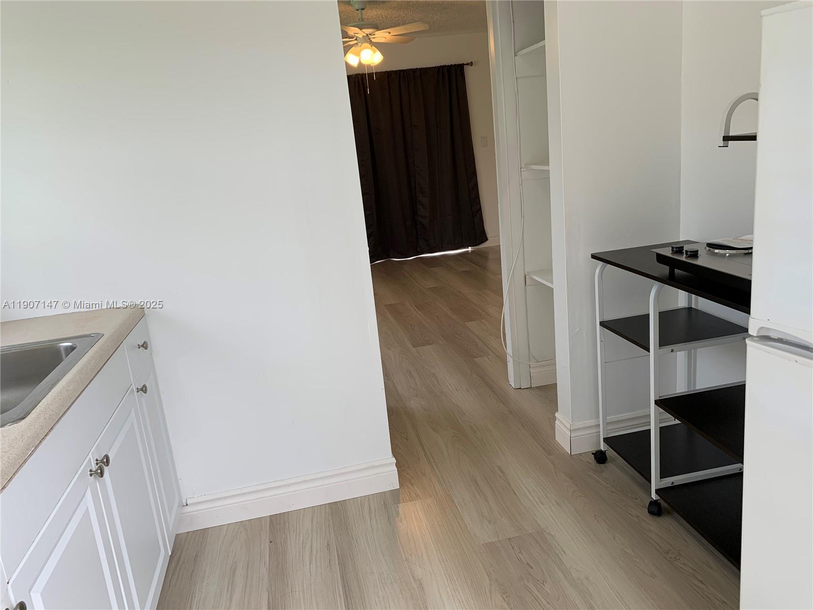 10040 Southwest 198th Street Cutler Bay, FL 33157 - Photo 7 of 17 a view of a walk in closet